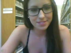 Sweet chick with glasses mastrubte in library