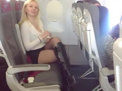 Blonde MILF Boards Airplane In Black Stockings And Boots